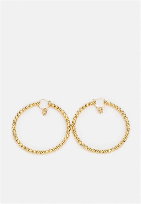 versace wokkel oorbellen|All Earrings .